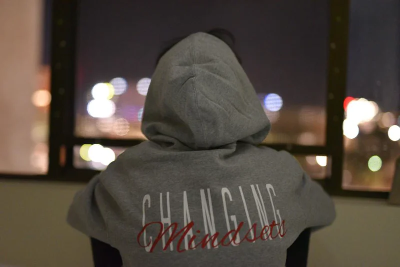 back of person in grey hoodie-growth mindset [ARTICLE]