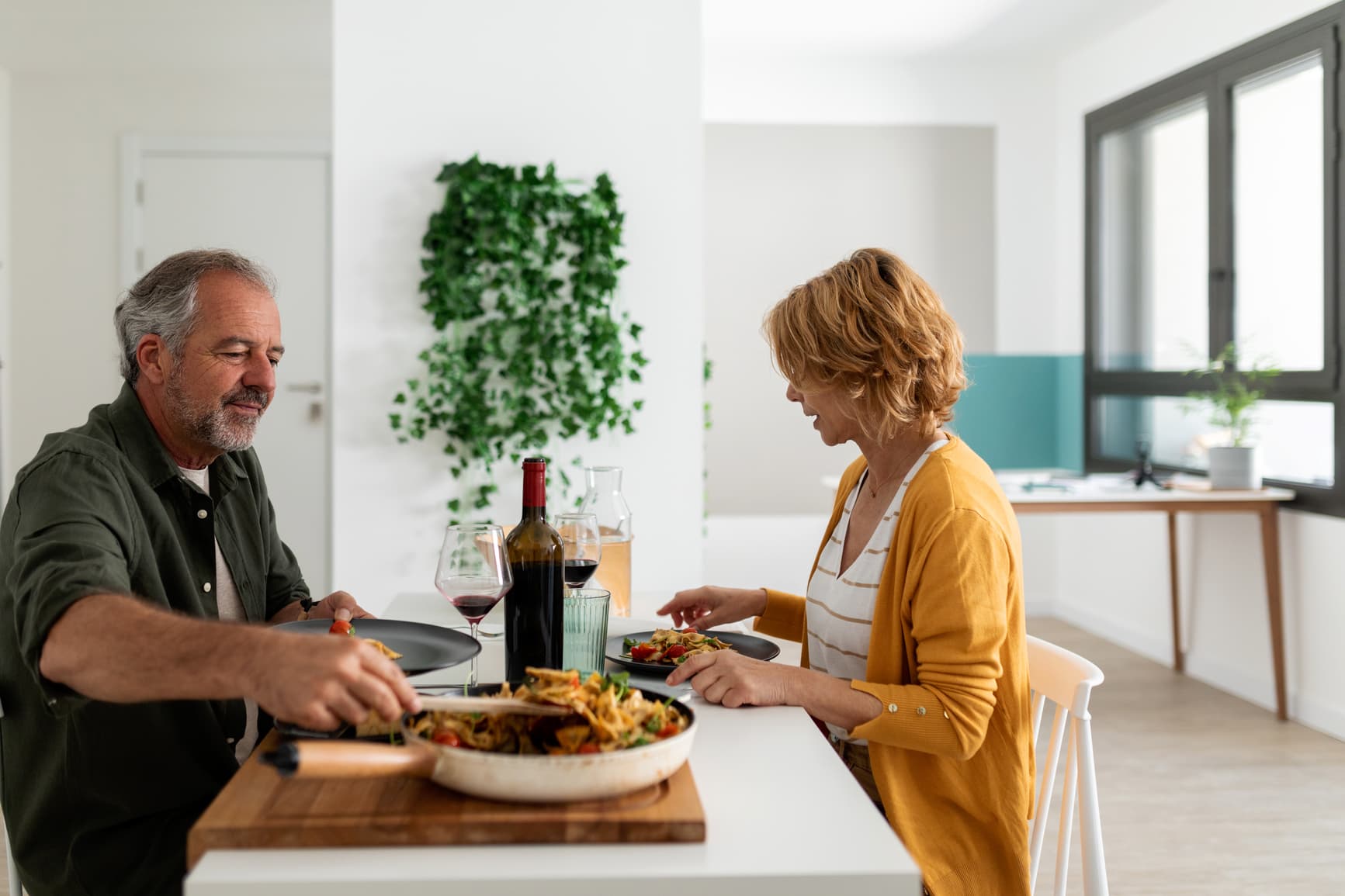 mature-couple-dining-together-navigating-midlife-crisis