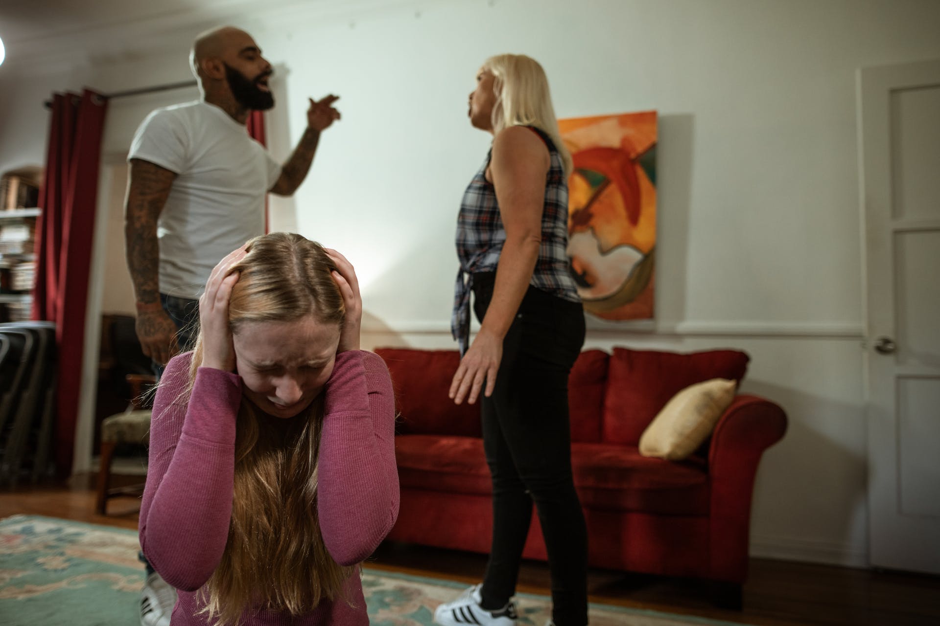 mom-and-dad-arguing-while-daughter-having-panic-attack-how-to-deal-with-toxic-family-members