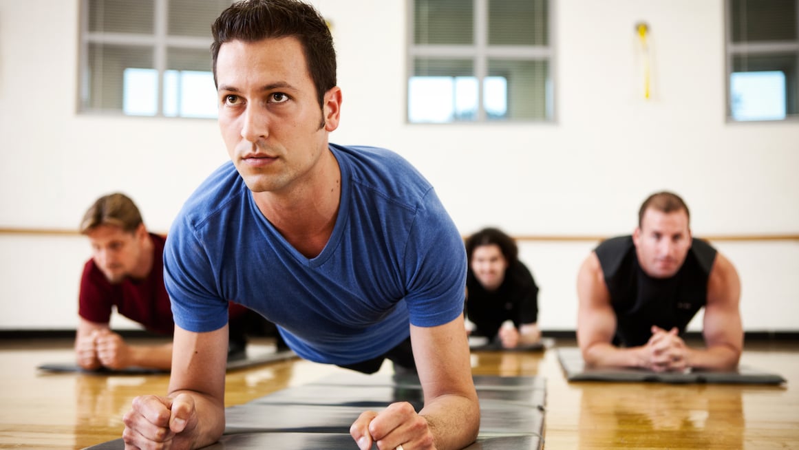 man-improves-health-and-wellbeing-in-workout-class