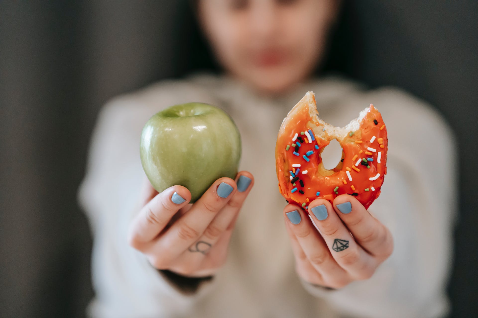 woman-holding-a-donut-and-fruit-decision-matrix