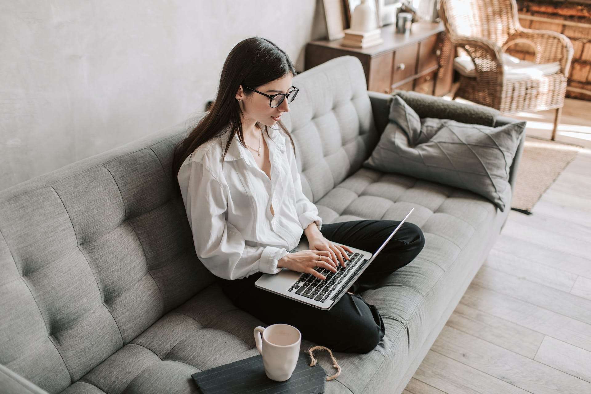 woman-working-in-the-couch-professional-development-plan